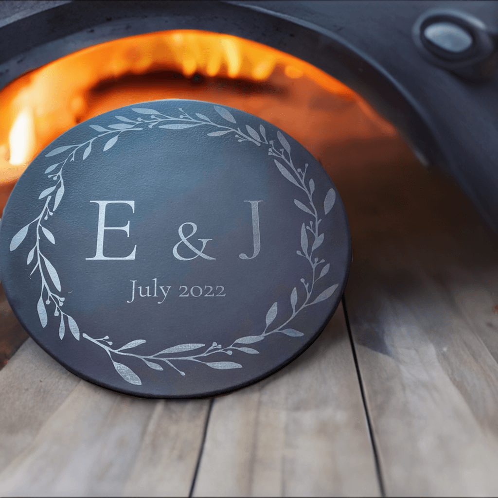 Custom laser engraved black cordierite pizza stone